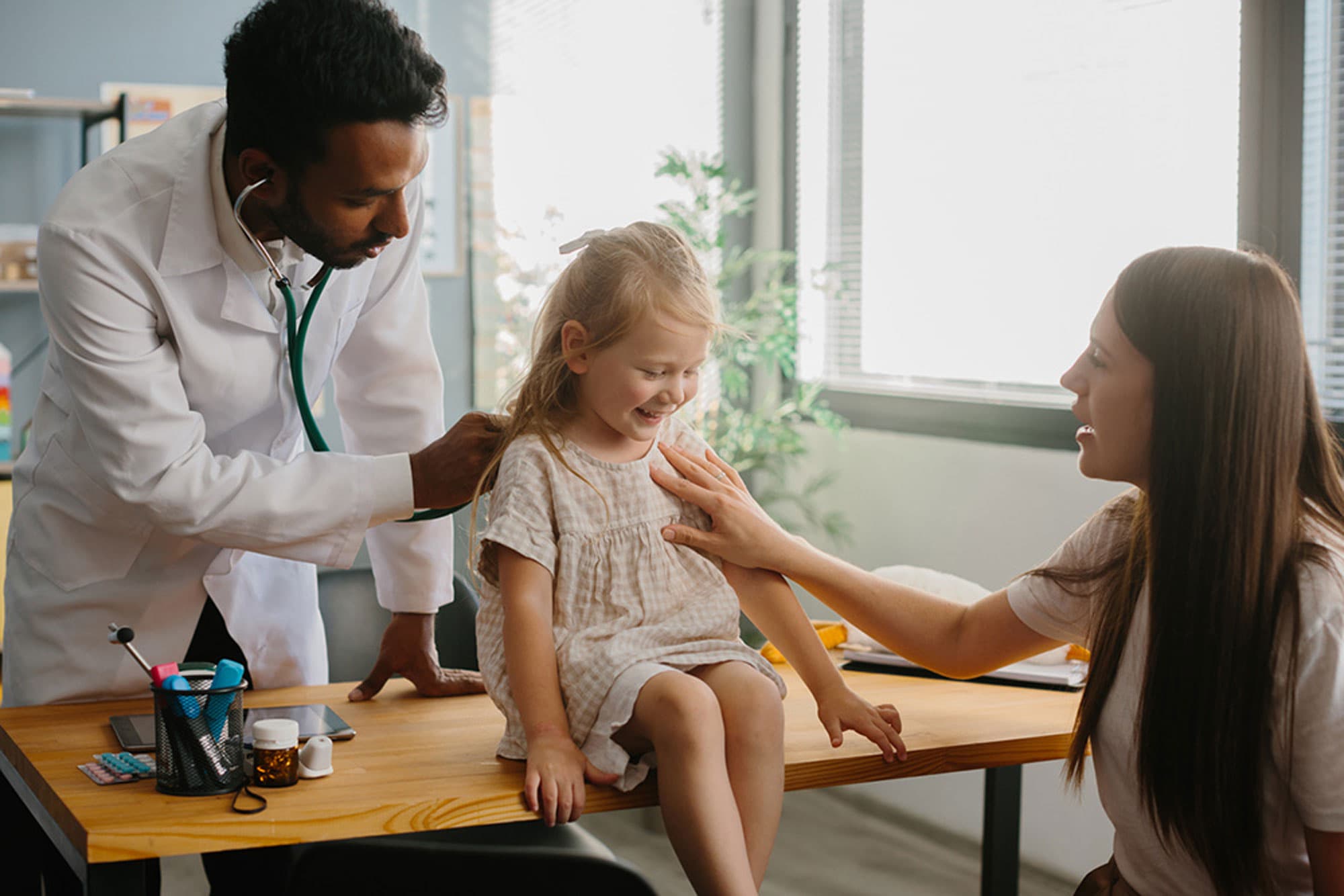 doctor caring for child