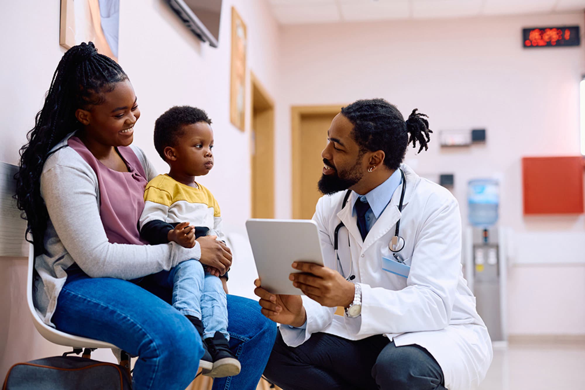Doctor giving baby a checkup